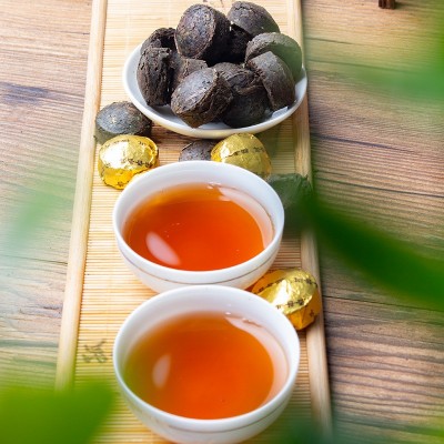 500克约100个糯米香普洱熟茶小沱茶饼云南勐海熟茶粒装糯香黑茶叶图3